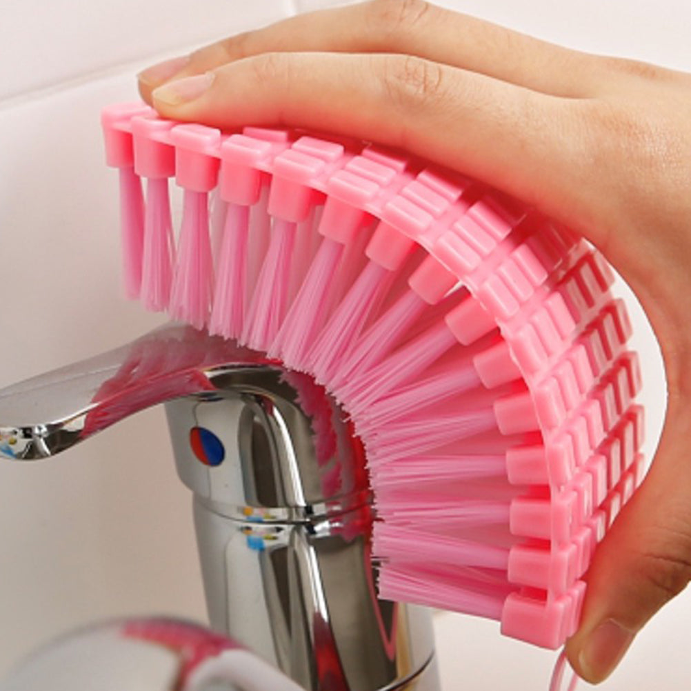 FLEXIBLE HAND-HELD CLEANING BRUSH